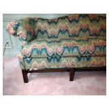 Custom Upholstered Camelback Sofa Chippendale style with stretcher base frame. L 7’ x W 32” x H 32”