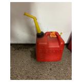 11 empty gas cans of various sizes