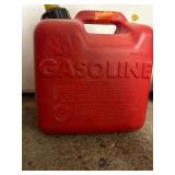 11 empty gas cans of various sizes