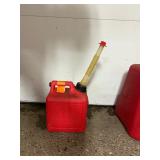 11 empty gas cans of various sizes