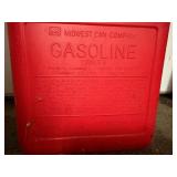 11 empty gas cans of various sizes