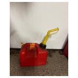 11 empty gas cans of various sizes