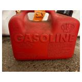 11 empty gas cans of various sizes