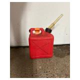 11 empty gas cans of various sizes