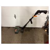 Black & Decker LE500 2HP electric lawn trimmer;  Toro plug-in Leaf Blower Ultra Blower Vac