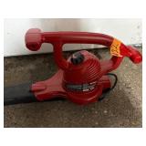 Black & Decker LE500 2HP electric lawn trimmer;  Toro plug-in Leaf Blower Ultra Blower Vac