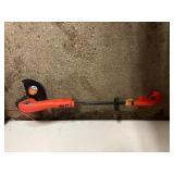 Ryobi easy-edge, battery powered hedge trimmer (Battery not included); Black and Decker Grass Hog 12” plug in Weed Wacker