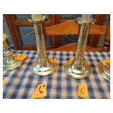 4  Baldwin Brass candlestick holders 3 are 6” tall and 1 is 4” tall