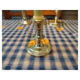 4  Baldwin Brass candlestick holders 3 are 6” tall and 1 is 4” tall