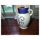 9 pottery pieces: Williamsburg Pottery 2 crocks; 2 pitchers; coffee cup; 3 Serving bowls; BBP coffee mug