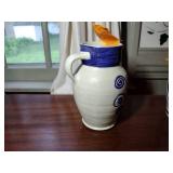 9 pottery pieces: Williamsburg Pottery 2 crocks; 2 pitchers; coffee cup; 3 Serving bowls; BBP coffee mug