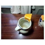 9 pottery pieces: Williamsburg Pottery 2 crocks; 2 pitchers; coffee cup; 3 Serving bowls; BBP coffee mug