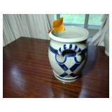 9 pottery pieces: Williamsburg Pottery 2 crocks; 2 pitchers; coffee cup; 3 Serving bowls; BBP coffee mug