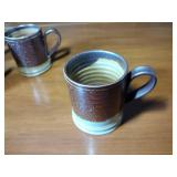Williamsburg C4W pottery 10 pcs: One bowl 6 ½” diam.x 3 ¼” t, 8 cups 3 ½” t, one 1991 stein 5 “ t