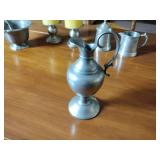 17 metal pieces: Pewter wall candle sconces. Pewter oval platter, Royal Holland syrup pitcher
