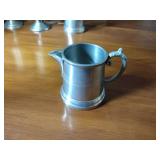 17 metal pieces: Pewter wall candle sconces. Pewter oval platter, Royal Holland syrup pitcher