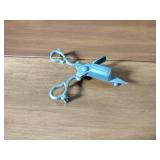 Pewter Items: Wick Trimmer, covered bowl, gravy boat, 2 Etain pitchers, Etain pitcher, candlestick holders