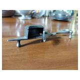 Pewter Items: Wick Trimmer, covered bowl, gravy boat, 2 Etain pitchers, Etain pitcher, candlestick holders