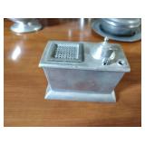 Pewter Items: Wick Trimmer, covered bowl, gravy boat, 2 Etain pitchers, Etain pitcher, candlestick holders