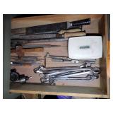 Drawer of tools such as combination wrenches, files, picks, hole cutter