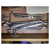 Drawer of tools such as combination wrenches, files, picks, hole cutter