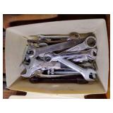 Drawer of tools such as combination wrenches, files, picks, hole cutter