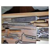 Drawer of tools such as combination wrenches, files, picks, hole cutter