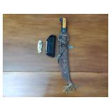 Machete with decorative sheath; 10-point Buck collectors knife by the Franklin Mint