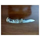 Machete with decorative sheath; 10-point Buck collectors knife by the Franklin Mint