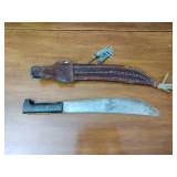 Machete with decorative sheath; 10-point Buck collectors knife by the Franklin Mint