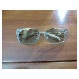 4 pairs of sunglasses, 1 eye glasses