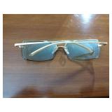 4 pairs of sunglasses, 1 eye glasses