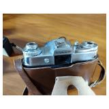 Canon AE-1 camera; Minolta Freedom GT; Hawkey Instamatic; Voigtlander Bessamatic 35mm SLR.