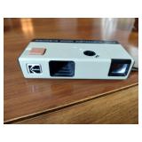 Canon AE-1 camera; Minolta Freedom GT; Hawkey Instamatic; Voigtlander Bessamatic 35mm SLR.