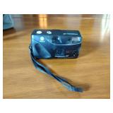 Canon AE-1 camera; Minolta Freedom GT; Hawkey Instamatic; Voigtlander Bessamatic 35mm SLR.