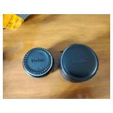 Canon AE-1 camera; Minolta Freedom GT; Hawkey Instamatic; Voigtlander Bessamatic 35mm SLR.