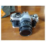 Canon AE-1 camera; Minolta Freedom GT; Hawkey Instamatic; Voigtlander Bessamatic 35mm SLR.