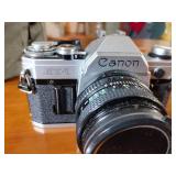 Canon AE-1 camera; Minolta Freedom GT; Hawkey Instamatic; Voigtlander Bessamatic 35mm SLR.