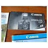 Canon AE-1 camera; Minolta Freedom GT; Hawkey Instamatic; Voigtlander Bessamatic 35mm SLR.