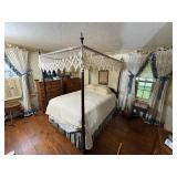 Queen size 4-poster canopy wood bed. Custom made skirt included.