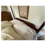 Queen size 4-poster canopy wood bed. Custom made skirt included.