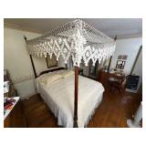 Queen size 4-poster canopy wood bed. Custom made skirt included.