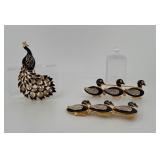 3 Vintage Brooches: (2) Waddle of 3 blue enamel ducks with rhinestones on bar pin & one peacock
