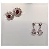 2 pierced earrings, one pear cut dangle post,  stud with red gemstone center surrounded by rhinestones