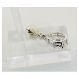 2 pierced earrings, one pear cut dangle post,  stud with red gemstone center surrounded by rhinestones