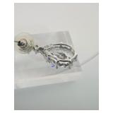 2 pierced earrings, one pear cut dangle post,  stud with red gemstone center surrounded by rhinestones