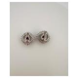 2 pierced earrings, one pear cut dangle post,  stud with red gemstone center surrounded by rhinestones