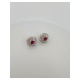 2 pierced earrings, one pear cut dangle post,  stud with red gemstone center surrounded by rhinestones