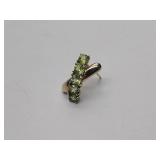 10k gold pierced earrings with green stones