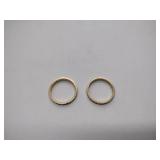 2 gold bands, not sure what purity the metal is.